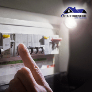 Inspecting an electrical breaker panel during a home inspection