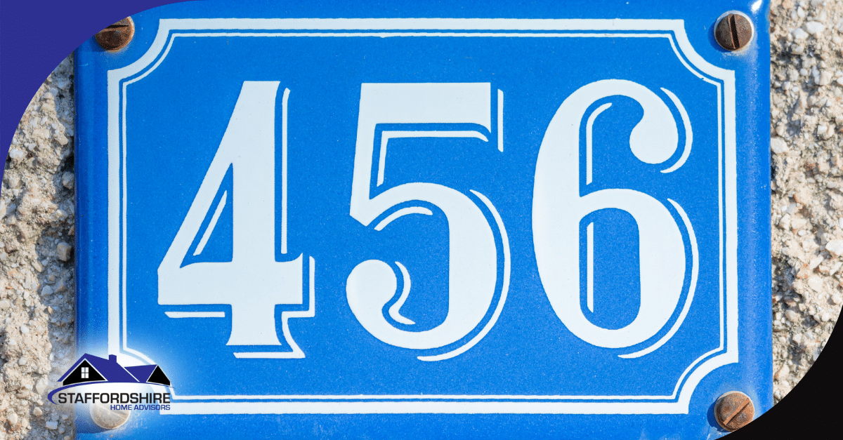 Blue metal plaque showing house number 456 with white numbers.
