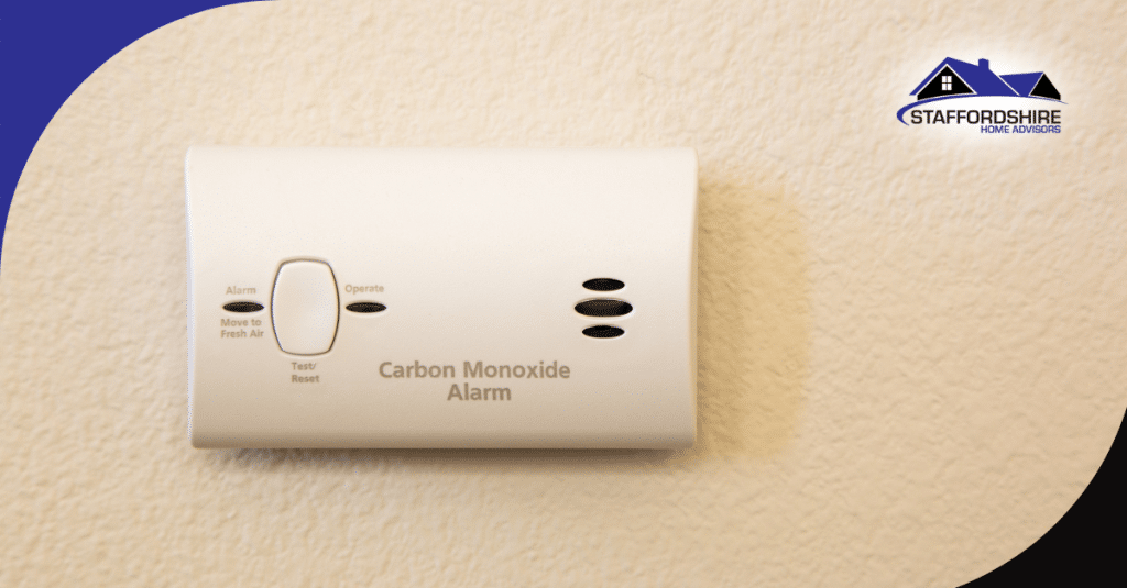 Carbon monoxide alarm mounted on a wall.