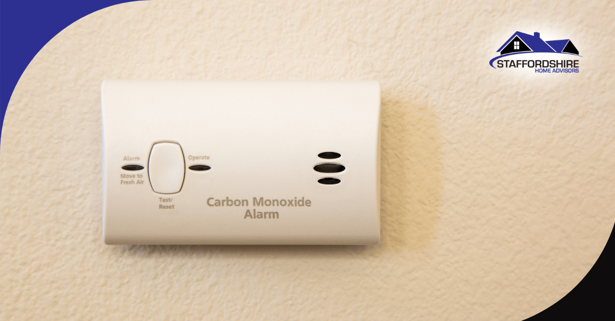Carbon monoxide alarm mounted on a wall.